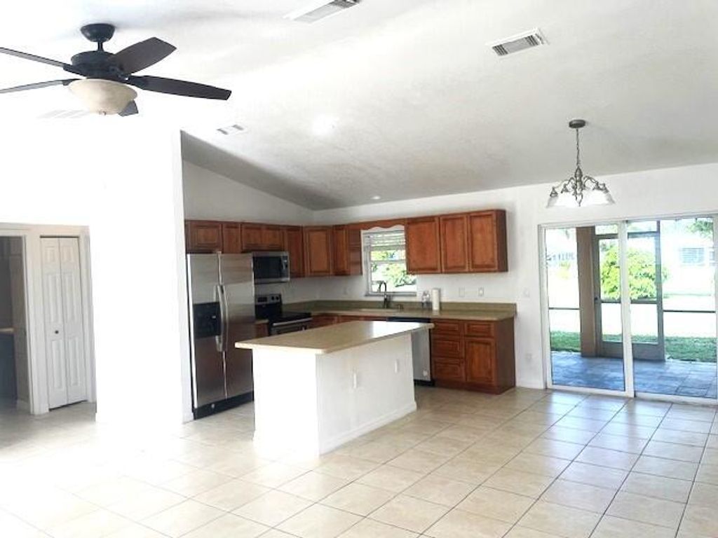 Photo of 2906 SW Boxwood Circle, Port Saint Lucie, FL 34953 (MLS # R10942174)