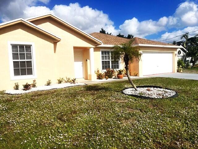 Photo of 2906 SW Boxwood Circle, Port Saint Lucie, FL 34953 (MLS # R10942174)