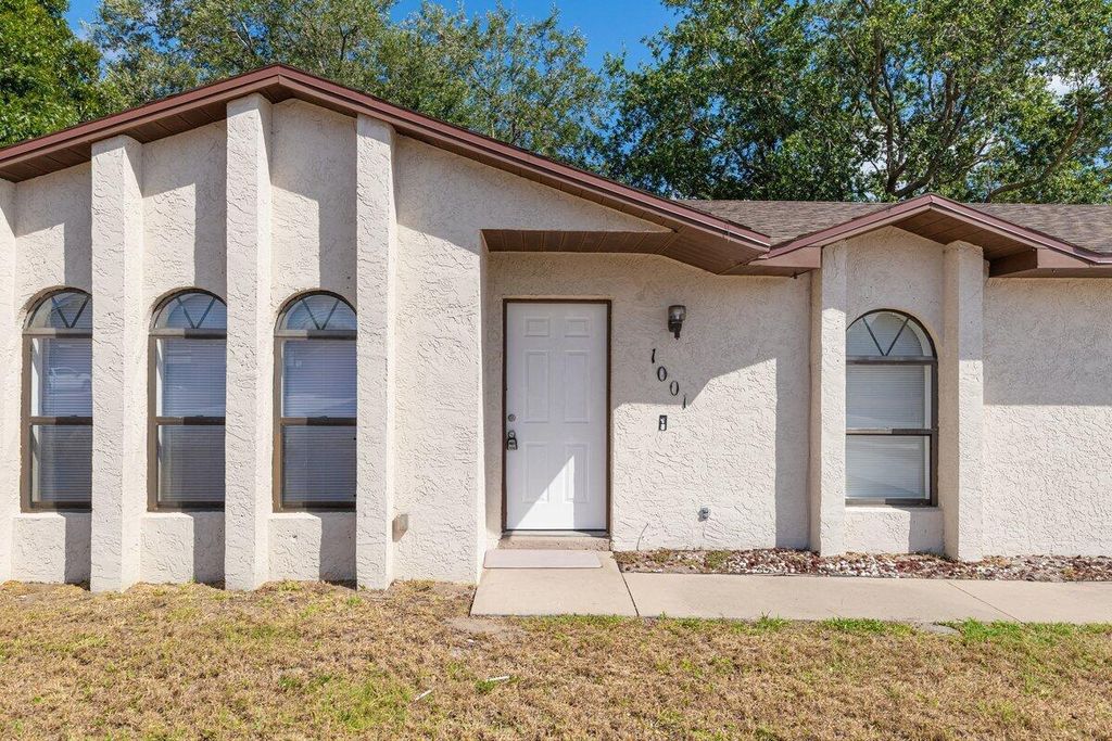 Photo of 1001 SW California Boulevard, Port Saint Lucie, FL 34953 (MLS # R10983349)