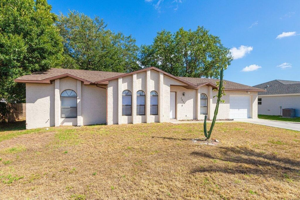 Photo of 1001 SW California Boulevard, Port Saint Lucie, FL 34953 (MLS # R10983349)