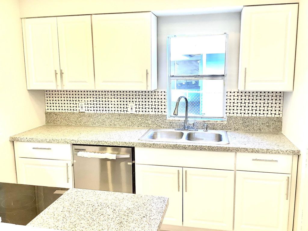 Photo of 107 Camelot Drive, Fort Pierce, FL 34946 (MLS # F10432351)