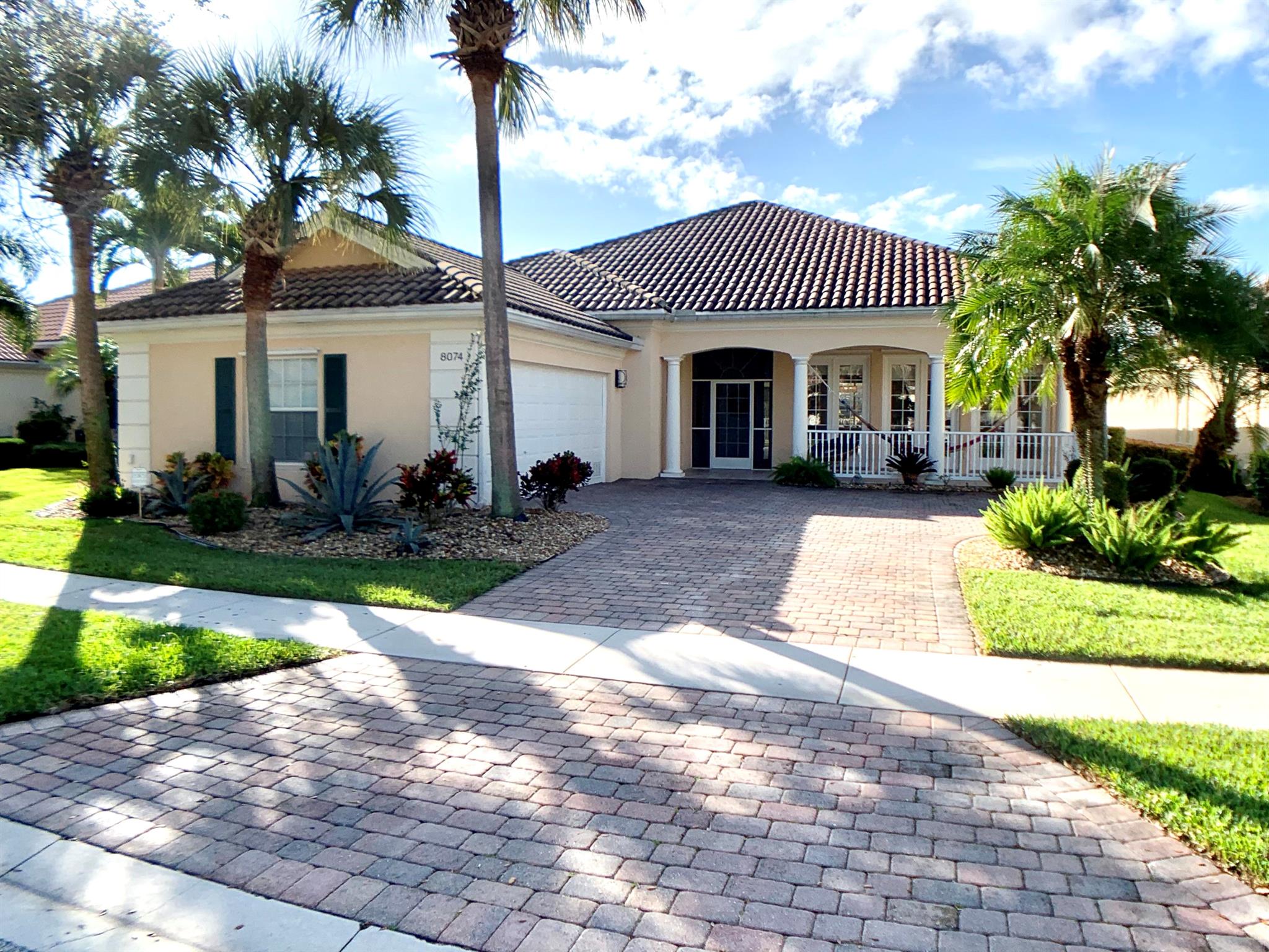 Enjoy your mornings by the pool, overlooking a large canal that is part of the wildlife preserve inside Village Walk. Beautiful waterfront pool home in this sought after gated enclave. Adjacent to the Wellington Tennis Center, and just minutes to WEF, Global Dressage, Polo venues, and all shops and restaurants. The perfect place to spend your season! The community has state of the art tennis courts as well as two pools, gym, a fitness path, and an Italian restaurant.