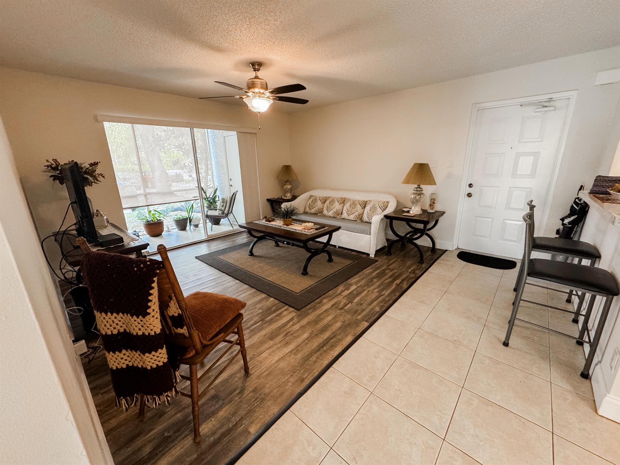 Riverfront Community w/Ocean Access! 1ST FLOOR; NEW ROOF Effortless living with this 2/2 first floor condo--freshly painted, tastefully updated, and partially furnished for a seamless move-in experience! Bring your boat - no fixed bridges! Boat slip/lift may be available for lease or purchase. Enjoy sunset strolls along the St. Lucie river, dive into the sparkling pool or hot tub, or join neighbors for lively clubhouse gatherings. Plus, this sought-after location is just a short walk to the Botanical Gardens and future Port District, where you'll have access to waterfront dining, docking, and family-friendly events just moments away! Convenient to Mets Stadium and nearby beaches. SCHEDULE YOUR TOUR TODAY!