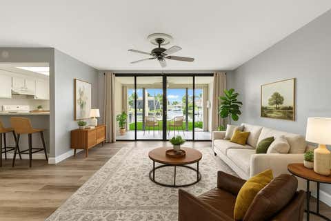Photo of 1950 SW Palm City Road #5-104, Stuart, FL 34994 (MLS # B26056002)