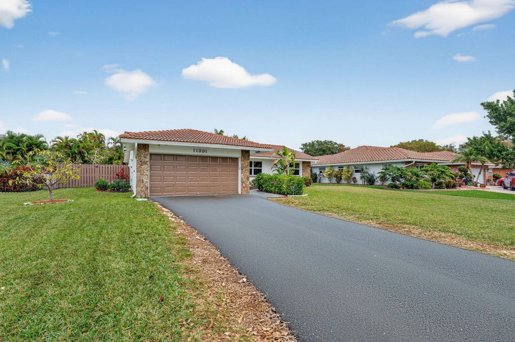 Photo of 11391 NW 20th Drive, Coral Springs, FL 33071 (MLS # R11160484)