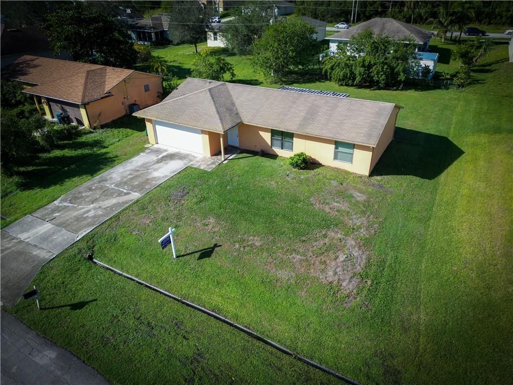 Photo of 174 NW Carmelite St, Port St Lucie, FL 34983 (MLS # F10347327)