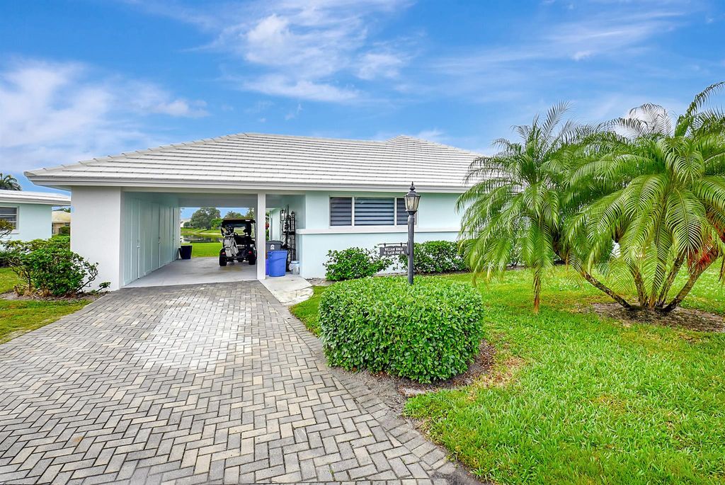 Photo of 10 Slash Pine Drive, Boynton Beach, FL 33436 (MLS # R10980665)