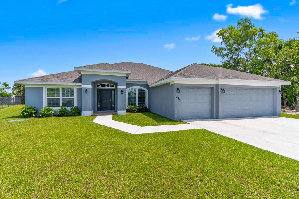 Photo of 2367 SE Avalon Road, Port St Lucie, FL 34952 (MLS # R10896088)