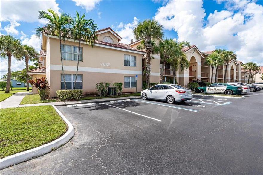 Spacious three bedroom condo in the heart of Tamarac! Open floor plan with vaulted ceilings. There is laminate flooring in living areas. Kitchen has wood cabinets and plenty of counter space. Ample sized living room with access to balcony. Dining room and snack bar option. Master suite has private balcony with relaxing lake views. Enormous walk in closet and updated bathroom. The two secondary bedrooms are split from master suite for privacy. Community has pool and tennis courts and lots of nicely landscaped and lake areas. This is a great opporunity for a first time buyer or an investor.