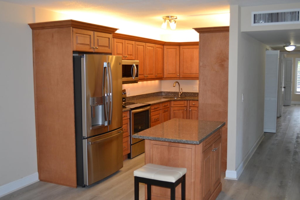 Photo of 1635 SW Silver Pine Way #109-E1, Palm City, FL 34990 (MLS # R10773552)