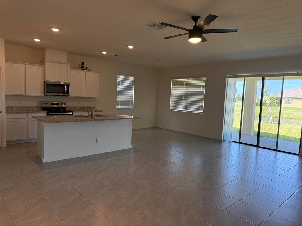 Photo of 10000 SW Triton Way, Port St Lucie, FL 34987 (MLS # R11091901)