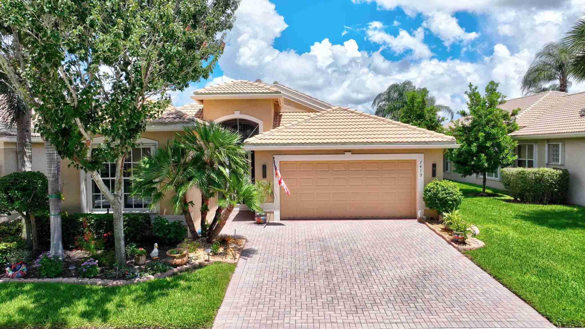 Step into this pristine Atlantic model home in Valencia Pointe, where elegance meets comfort. This stunning 3-bedroom, 2-bathroom lakefront home features diagonal ceramic tile in the main living areas and wood-plank tile in the bedrooms, creating a seamless and sophisticated feel.The third bedroom, currently an office, includes a convenient built-in Murphy bed. Every detail has been meticulously cared for, from the crown molding and high-end light fixtures to the custom built-ins in all closets.Enjoy serene lake views from the expansive, screened-in paver patio, which beautifully extends your living space.Live the resort lifestyle with Valencia Pointe's incredible clubhouse, offering a cafe, pools, a state-of-the-art gym, tennis and pickleball courts, a theater, and more.