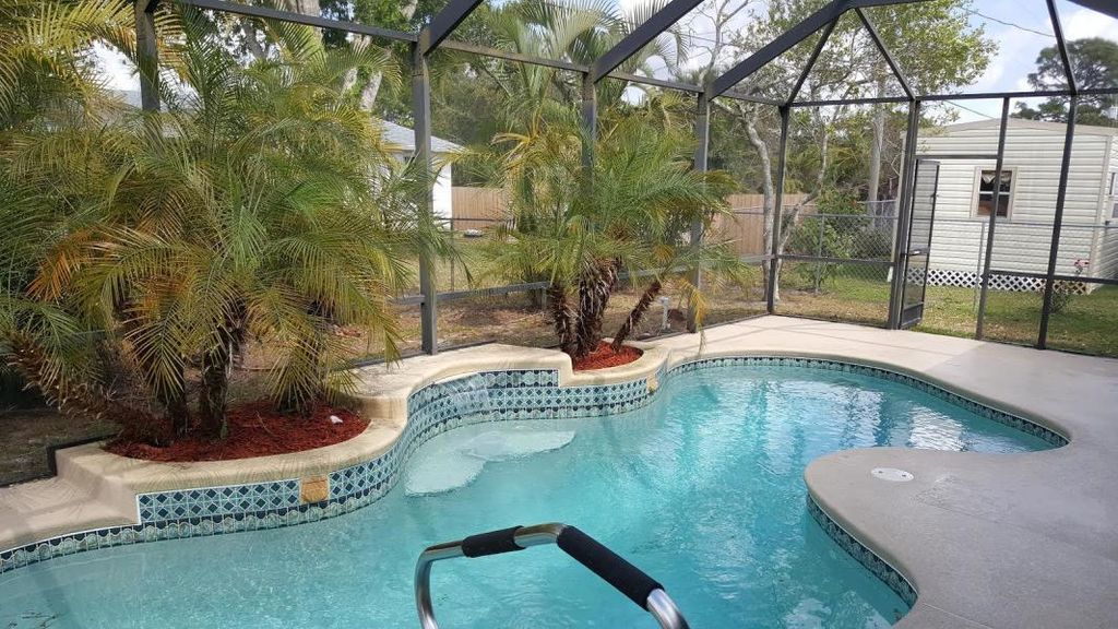 Photo of 430 SE Calmoso Drive, Port Saint Lucie, FL 34983 (MLS # R10785594)