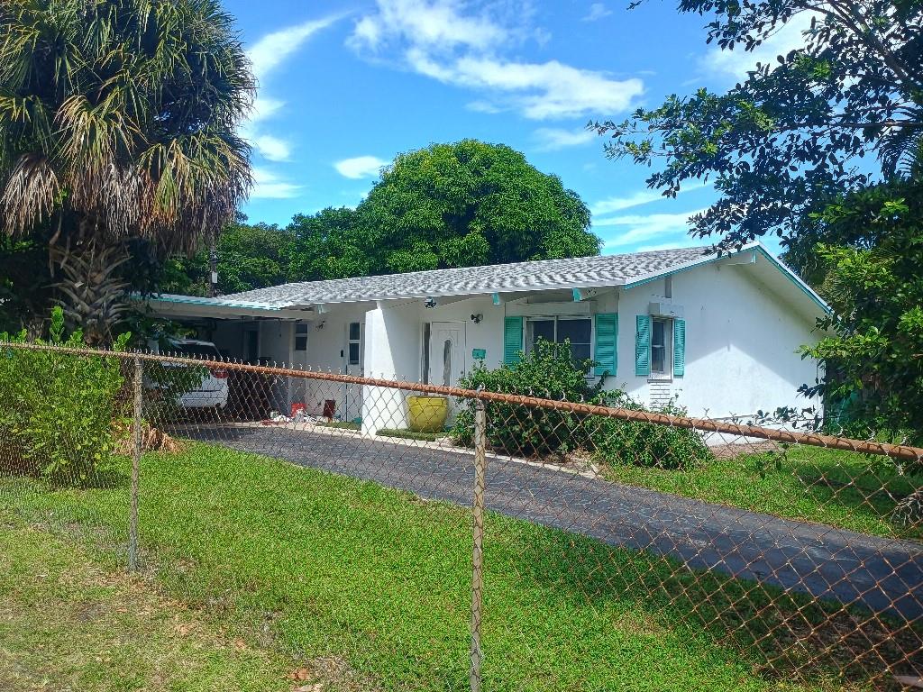 Many updates from prior ownership, House and sunroom have new windows installed, Bathroom was updated, and new flooring put in living room. Great location and family neighborhood. Close to 95, Okeechobee and Outlets. Vaulted ceilings, fresh paint. 2020 roof, newer water heater & tankless heater.