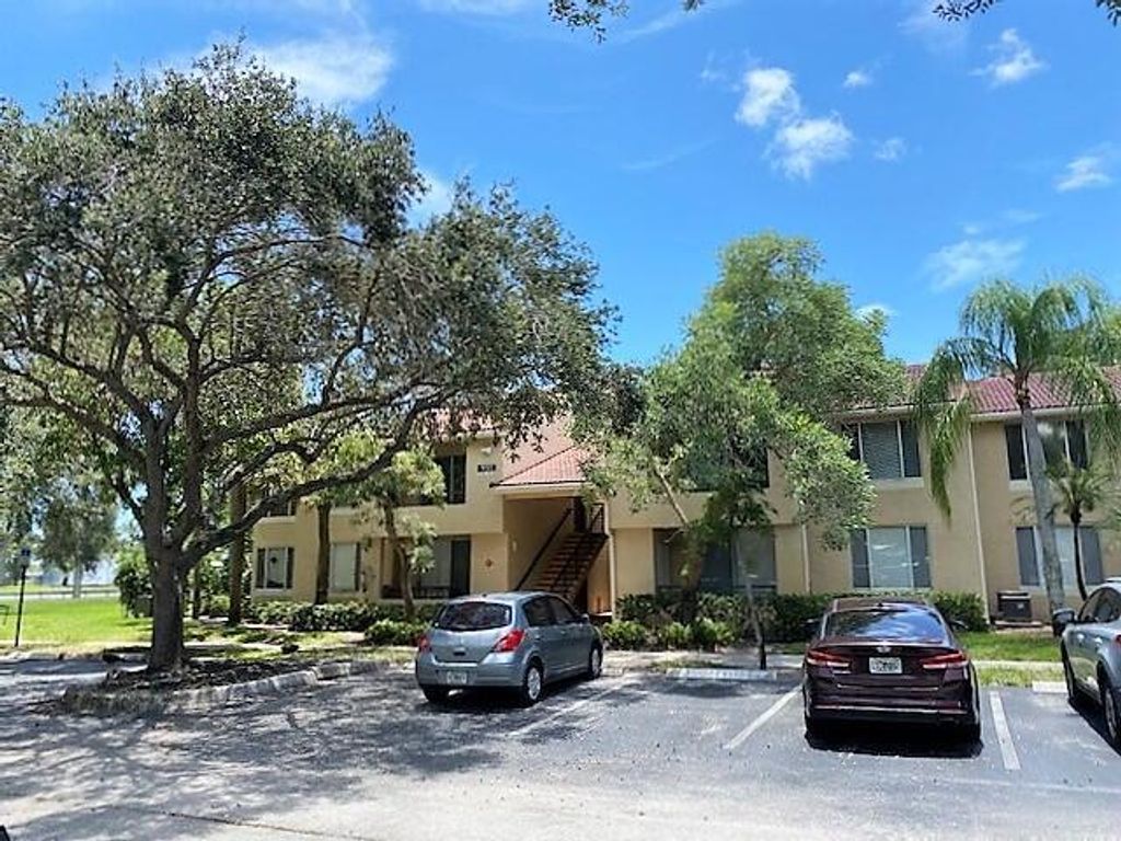 Photo of 931 Lyons Road #4201, Coconut Creek, FL 33063 (MLS # R11154425)