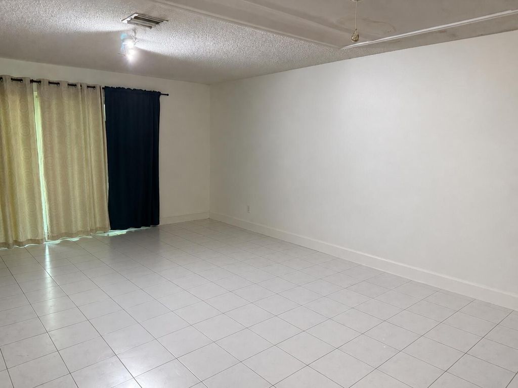 Photo of 12272 NW 36th Place, Sunrise, FL 33323 (MLS # B26033826)