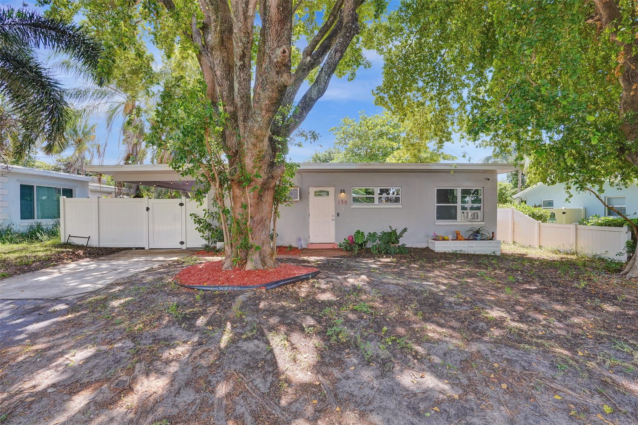Priced to SELL! Welcome to this beautiful single home with stunning views of Lake Osborne with NO HOA, 2 bedrooms + an office & 2 bathrooms. Featuring all impact windows, new wall a/c unit, newer electrical panel, newer water heater, newer refrigerator, washer & dryer. Enjoy this newly all fenced-in big backyard with lots of space for a boat/RV/jet ski or a pool. Plumbing is all copper & PVC. Excellent Location, a bike ride away from the vibrant downtown, 2 miles away from the beach, restaurants, parks, easy access to highways & more.