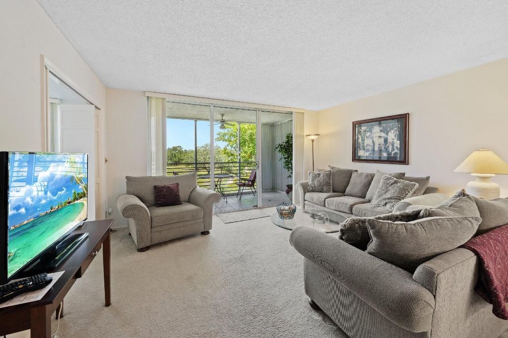 Photo of 3499 Oaks Way #310, Pompano Beach, FL 33069 (MLS # F10503459)