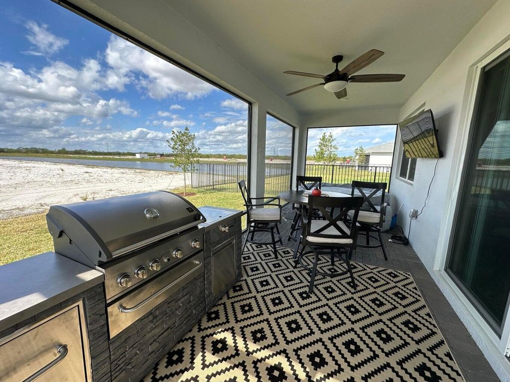 Photo of 10230 SW Orana Drive, Port Saint Lucie, FL 34987 (MLS # R11088804)