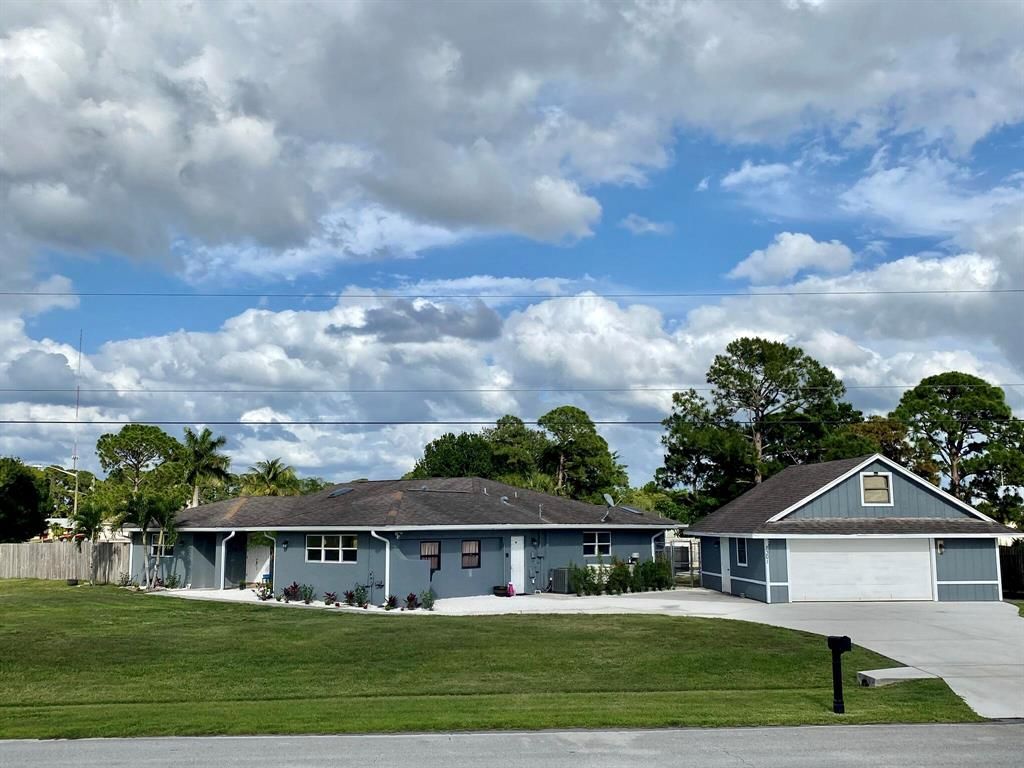 Photo of 2301 SE Gowin Drive, Port Saint Lucie, FL 34952 (MLS # R10738874)