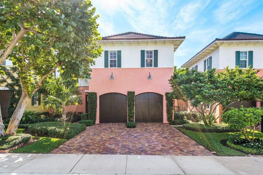 A tropical courtyard welcomes you to this 4 bedroom townhouse. Beautifully furnished with over 3,944 sq ft of living space and a total 5,414 under roof. This stunning corner property offers the privacy of a single family home with only 10 units in Ocean Hammock. Featuring impact windows  and doors, elevator, 2 verandas, living room with gas fireplace, coquina stone floors, extensive moldings, 2 car garage, and lushly landscaped yard and pool. Ocean Hammock townhouses had new roofs installed in 2022 and the exteriors were completely painted.