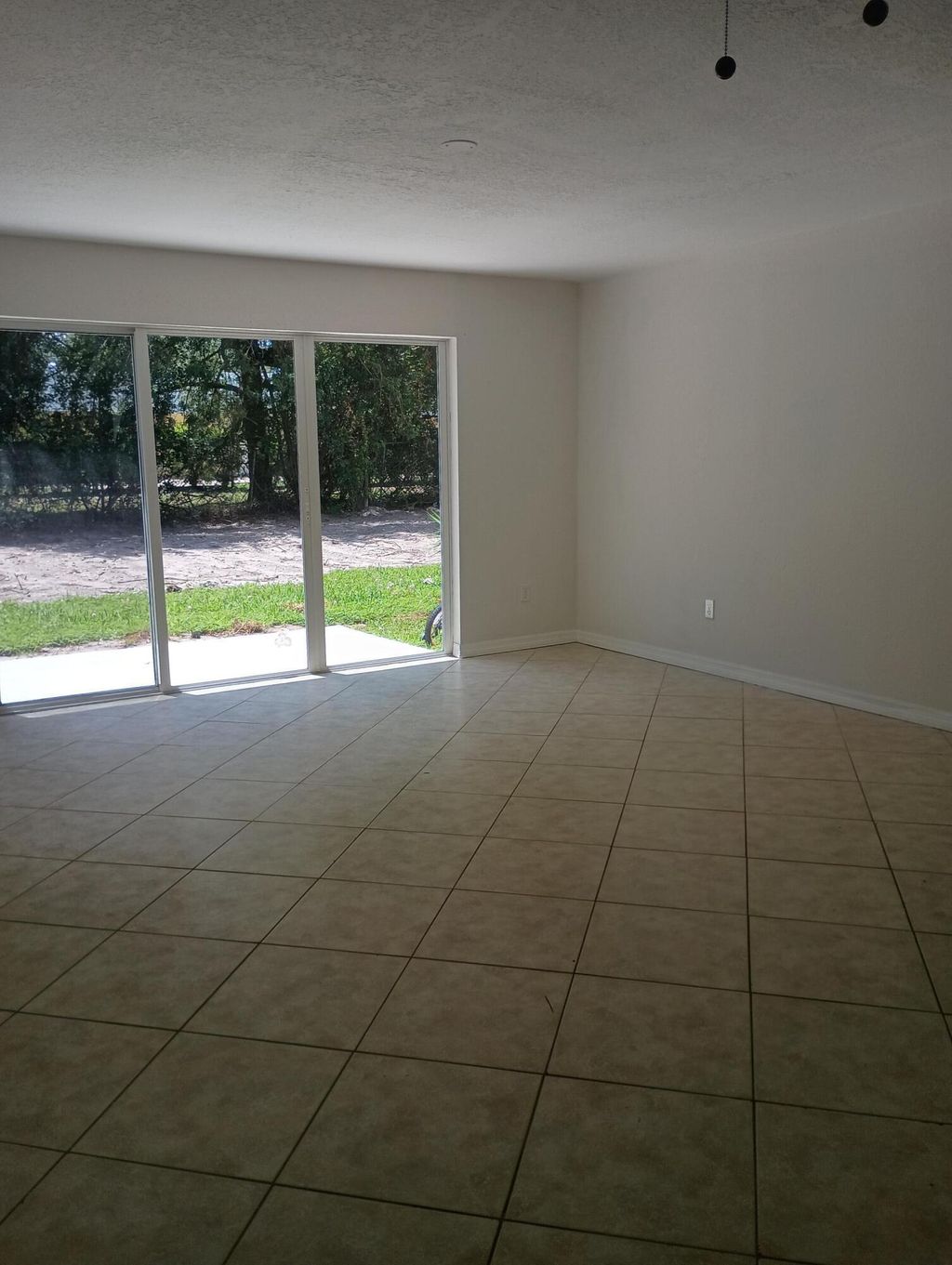 Photo of 203 Southland Drive #A, Fort Pierce, FL 34982 (MLS # B26046694)