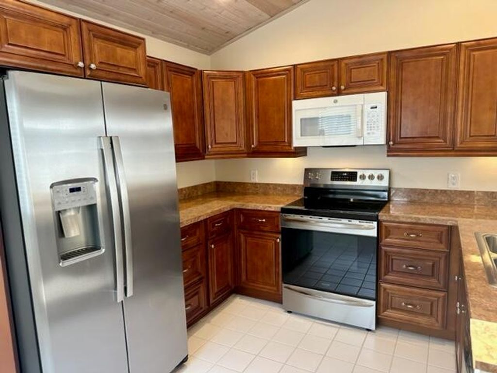 Photo of 6 Elgin Lane N, Palm Beach Gardens, FL 33418 (MLS # R10959022)