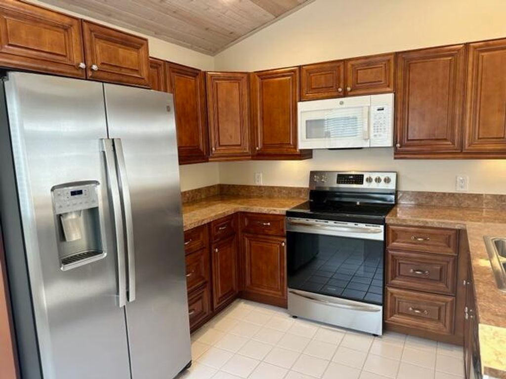 Photo of 6 Elgin Lane N, Palm Beach Gardens, FL 33418 (MLS # R10959022)