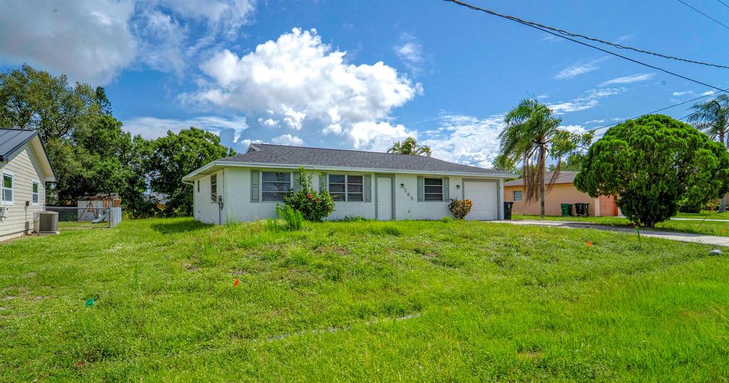 Photo of 355 NW Marion Avenue, Port Saint Lucie, FL 34983 (MLS # R11103345)