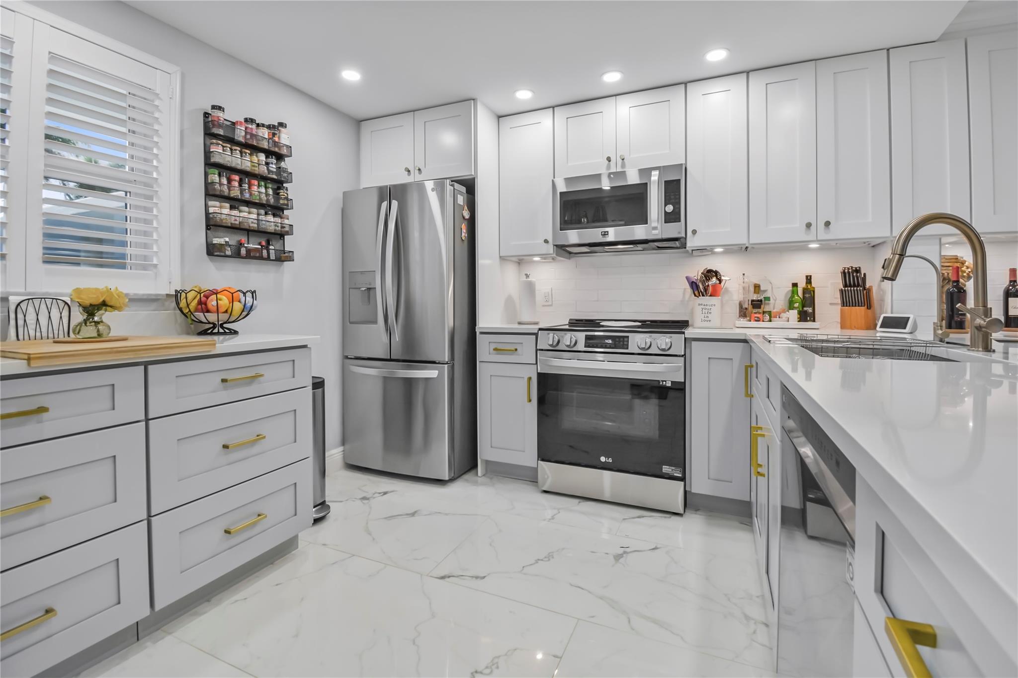 Discover the charm of Delray Beach in this beautifully updated 2/2 condo located at 2809 Florida Blvd. #107. Situated in a welcoming 55+ community right off the marina, this residence offers a spacious open design, abundant natural light, and high -end upgrades throughout. Throughout the unit hurricane-impact windows and doors provide added security and comfort while you enjoy the Florida Sunlight. Moments from the water, Atlantic Avenue, and pristine beaches - this home is turnkey and ready for its next chapter.