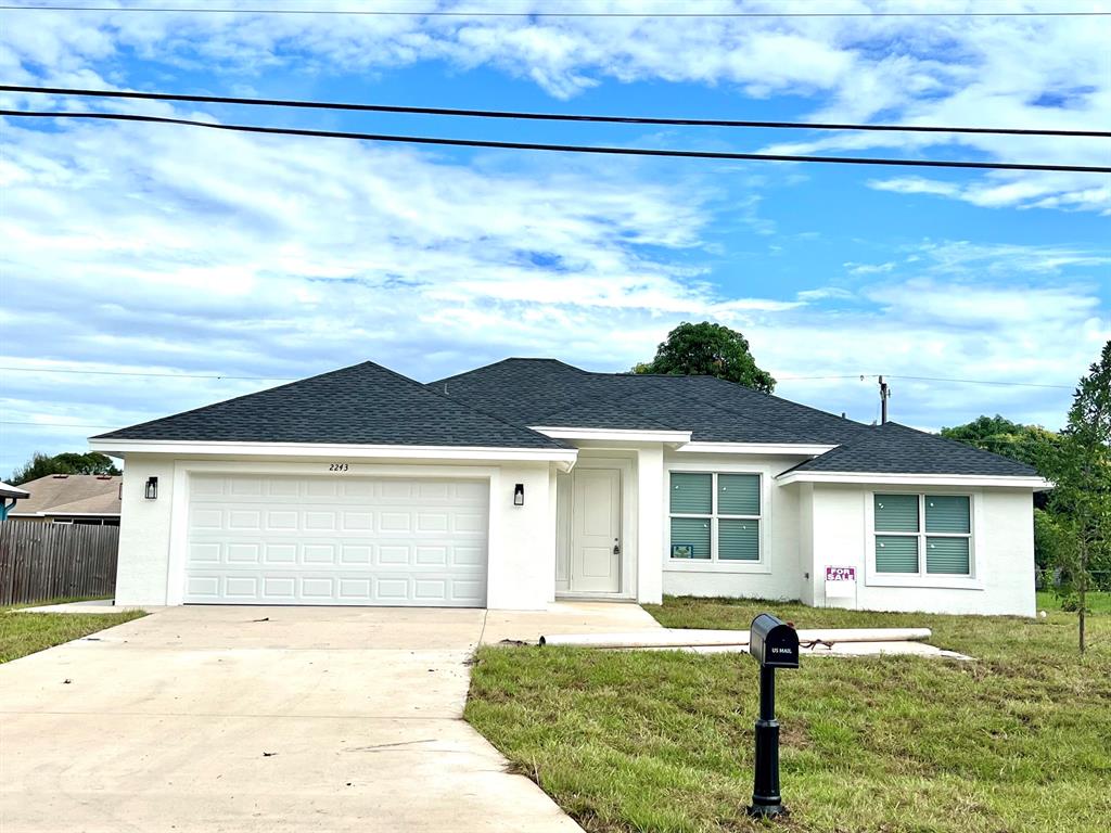 Newly built! beautiful 3 bed / 2 bath open floor plan home. NO CARPET! Porcelain tile & wood cabinets throughout the entire home as well as quartz countertops and window sills. A large master bath that includes 2 separate vanities, jacuzzi with tile up to the ceiling, water closet, shower. 2 walk in closets in the Master. Guest bath has gorgeous marble tiles on the walls. Laundry room under A/C not in the garage! Kitchen features new appliances and stunning pendants over the island. Then, you have triple sliding doors that lead to a covered patio with a large back yard great for entertaining. 2 Car garage with a sink. LED Lighting.