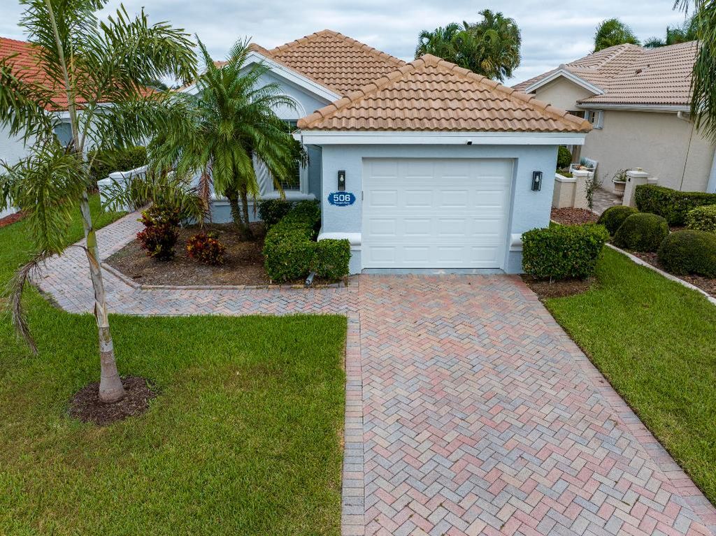 Photo of 506 SW Treasure Cove, Port Saint Lucie, FL 34986 (MLS # R11140062)
