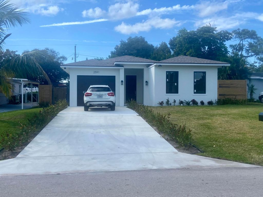 Photo of 2591 Gulfstream Road, Palm Springs, FL 33461 (MLS # R11058448)