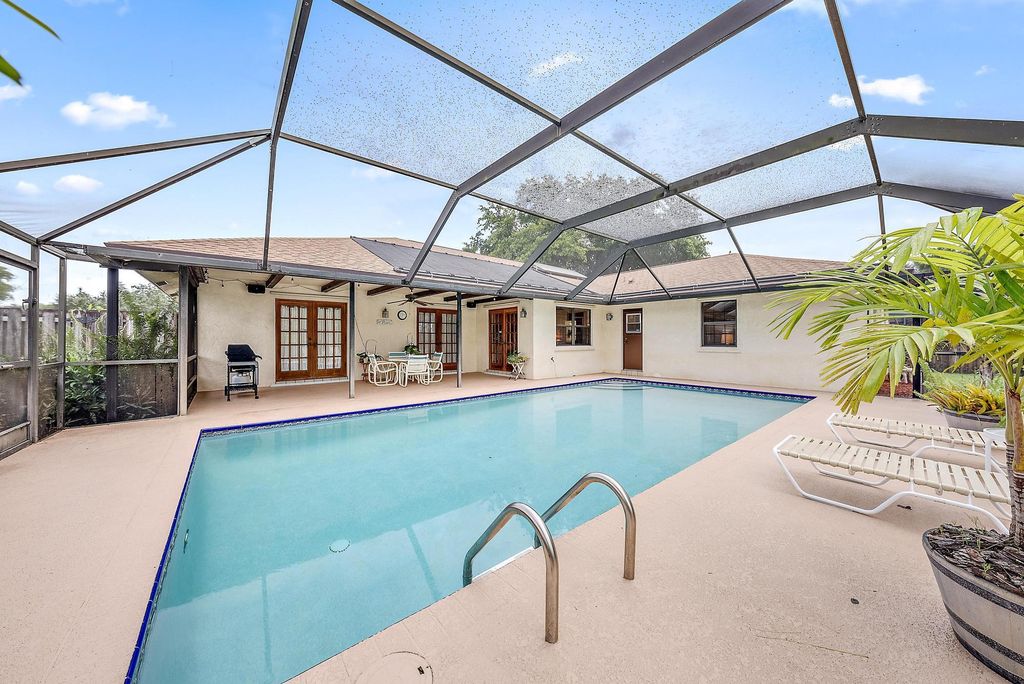 Photo of 7285 Woodland Creek Lane, Lake Worth, FL 33467 (MLS # R11028413)