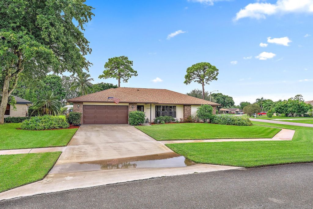 Photo of 7285 Woodland Creek Lane, Lake Worth, FL 33467 (MLS # R11028413)