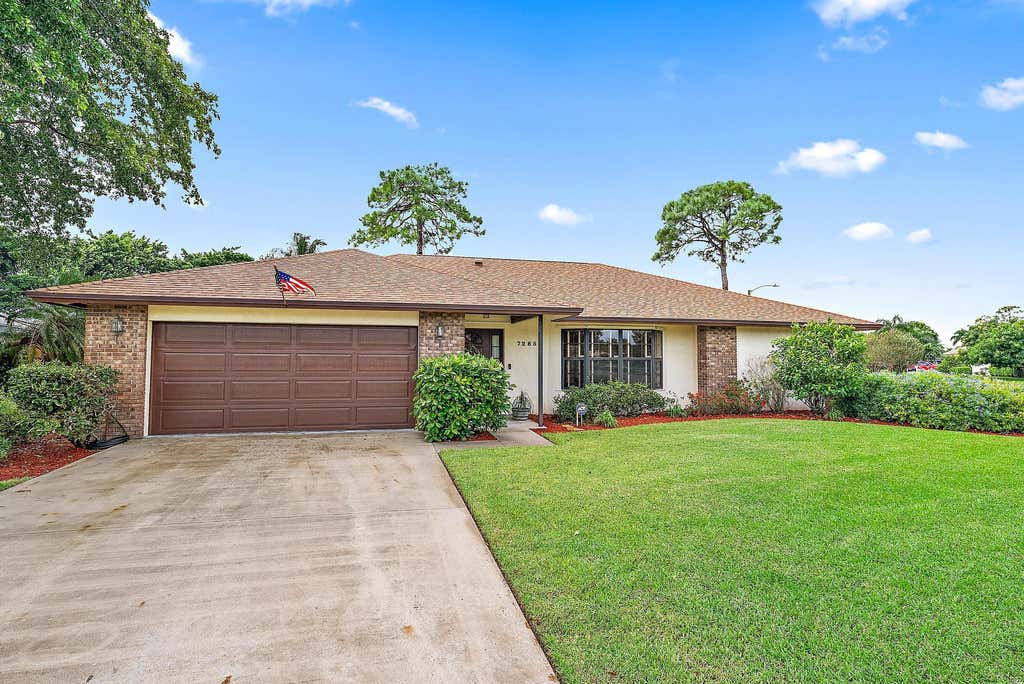 Photo of 7285 Woodland Creek Lane, Lake Worth, FL 33467 (MLS # R11028413)