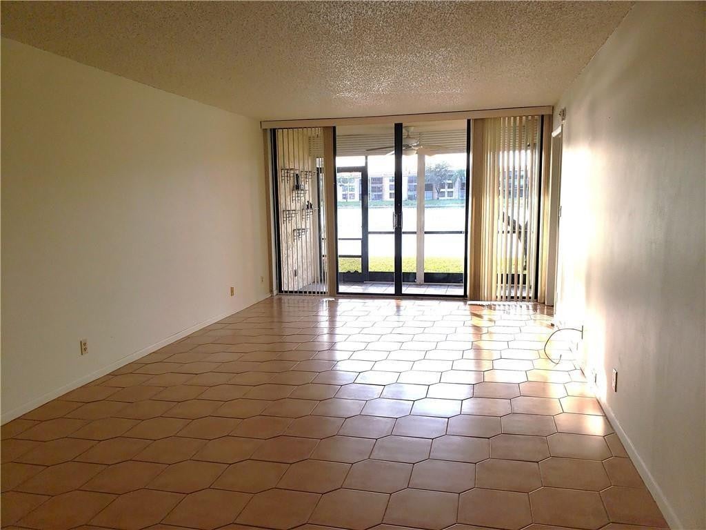 Photo of 6010 CORAL LAKE Drive #110, Margate, FL 33063 (MLS # B26081791)