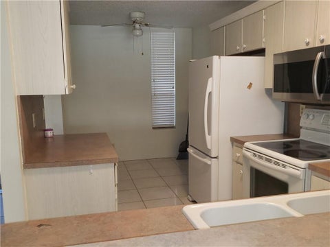 Tiny photo for 6010 CORAL LAKE Drive #110, Margate, FL 33063 (MLS # B26081791)