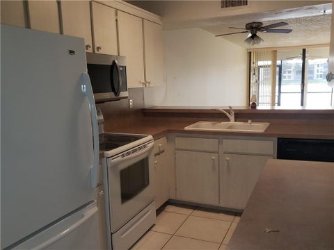 Tiny photo for 6010 CORAL LAKE Drive #110, Margate, FL 33063 (MLS # B26081791)