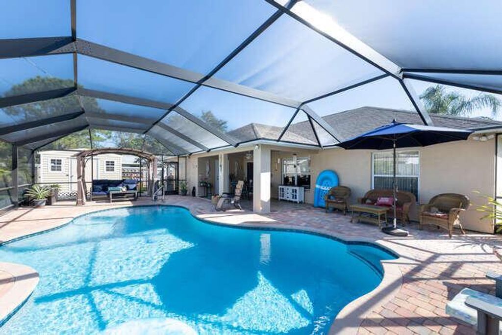Photo of 1750 SE Gaskins Circle, Port St Lucie, FL 34952 (MLS # R10887119)