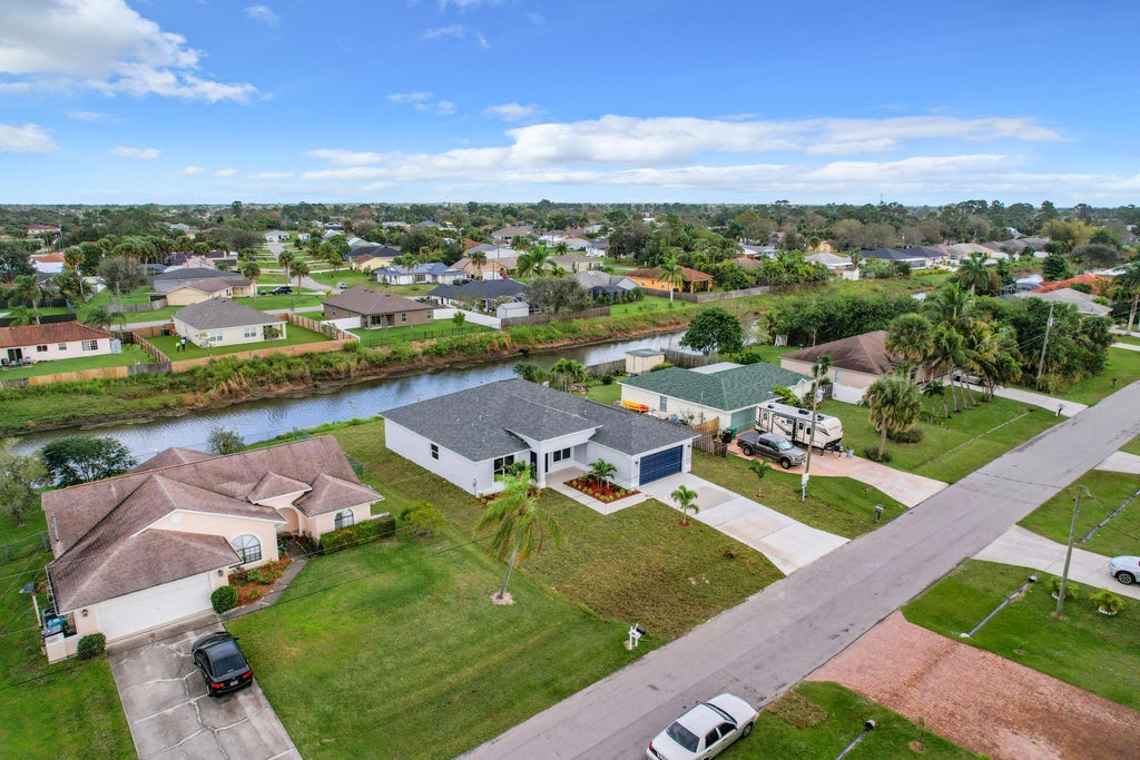 Photo of 1721 SW Del Rio Boulevard, Port Saint Lucie, FL 34953 (MLS # R10954111)