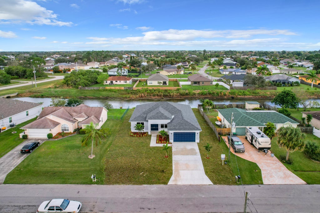 Photo of 1721 SW Del Rio Boulevard, Port Saint Lucie, FL 34953 (MLS # R10954111)