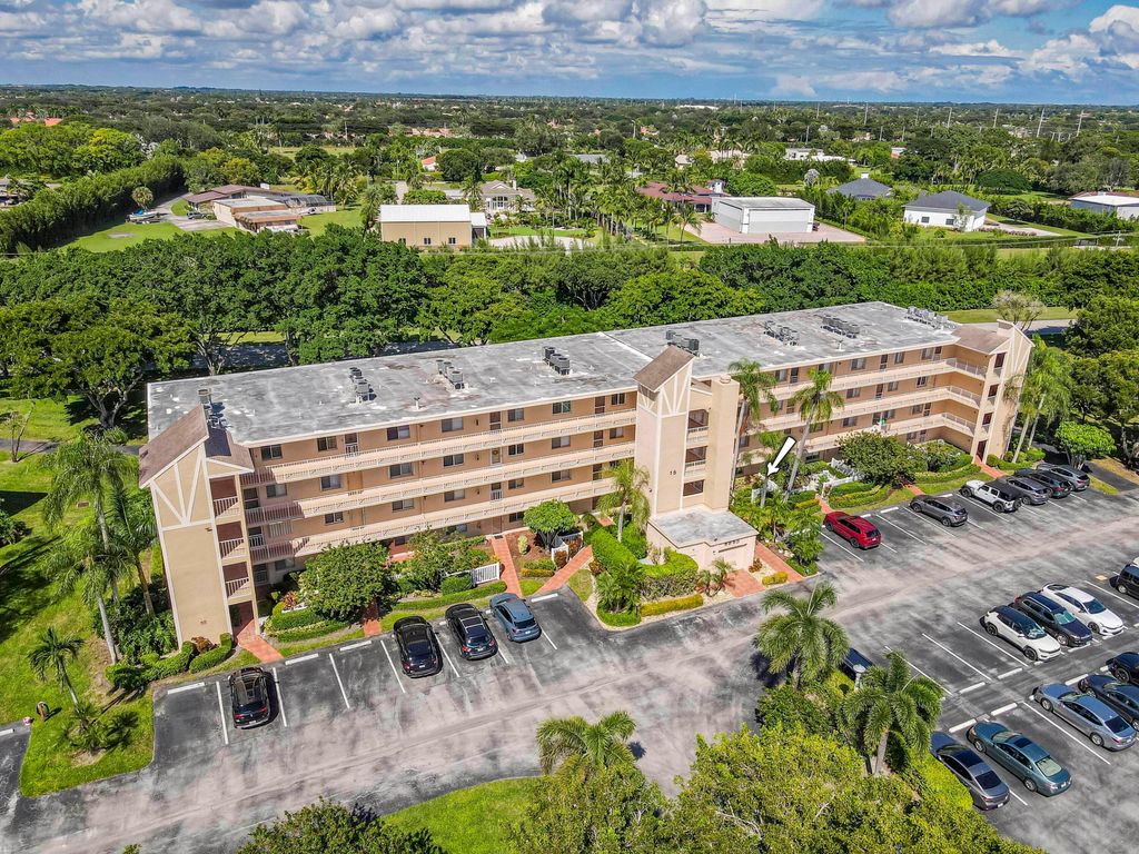 Photo of 6865 Huntington Lane #105, Delray Beach, FL 33446 (MLS # R11135710)