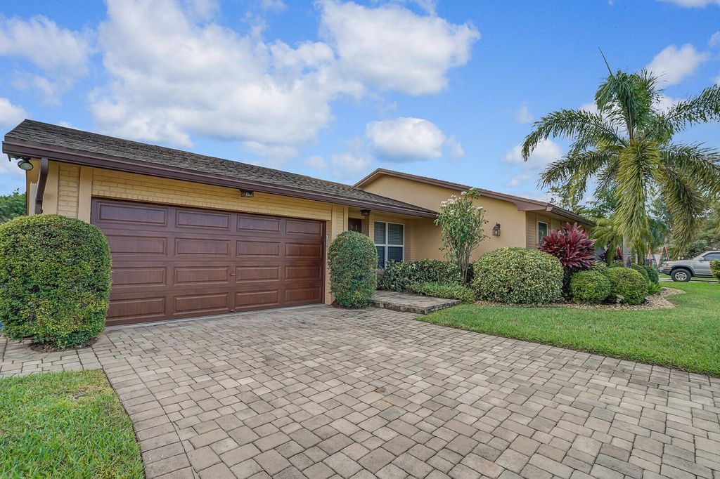 Photo of 1920 NW 42nd Street, Oakland Park, FL 33309 (MLS # F10417475)