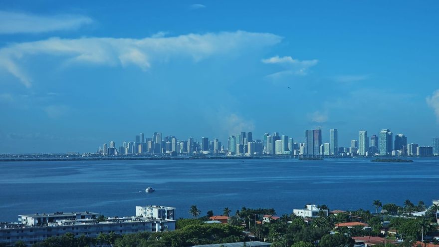 One of a kind waterfront corner unit with magnificent 180-degree panoramic views of downtown, bay and beaches. Biggest wraparound balcony in the building over 400 sqf. Ceiling to floor glass windows in all areas. Minutes away from beaches, airport and shopping.-2 bedroom, 2-bathroom condo. Newly renovated pool, gym and lobby area, clubhouse and plenty of guest parking! Must see to truly appreciate. two assigned parking spaces. Ideally situated just 15 minutes from South Beach, this residence combines comfort, convenience, and waterfront living. Rental Options:  $2,950/month - Unfurnished  $3,400/month - Fully Furnished Perfect for those seeking a stylish and well-located home with exceptional views.