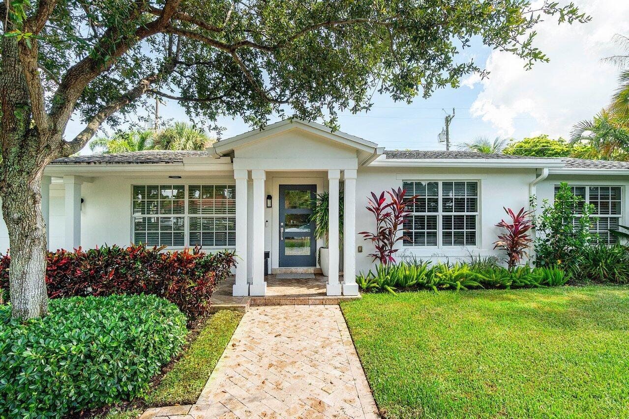 Just one block from scenic South Flagler Drive and the Intracoastal, this fully renovated 3BD/2BA gem in the coveted ''SoSo'' neighborhood offers style and lifestyle. Enjoy an airy open floor plan with impact glass, ceramic tile, and sleek finishes. The third bedroom functions perfectly as a home office. Outside, relax in your private backyard oasis with a 57-foot lap pool, outdoor shower, and lush landscaping. Features include a gas stove, stainless appliances, ADT security system, and a one-car garage--move-in ready and close to it all.