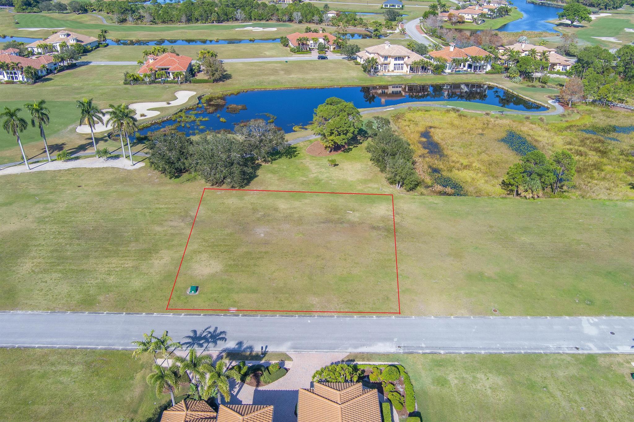 With views of the Arnold Palmer Golf Course Hole 11, this building site is just a short golf cart ride to the Iconic Tesoro Club House. If you're tired of the generic homes designed by national builders, Tesoro's building guidelines allow for custom homes featuring exterior designs that are highly sought after by today's families. Although, There is no timeframe to begin construction on this estate homesite, the property is out of the flood plains and ready for construction with all utilities and natural gas available at the curb. Tesoro is a manned gated community that prioritizes safety, offering 24-hour security for your peace of mind. Call us today to schedule an appointment to view this beautiful property and experience the serenity it offers.