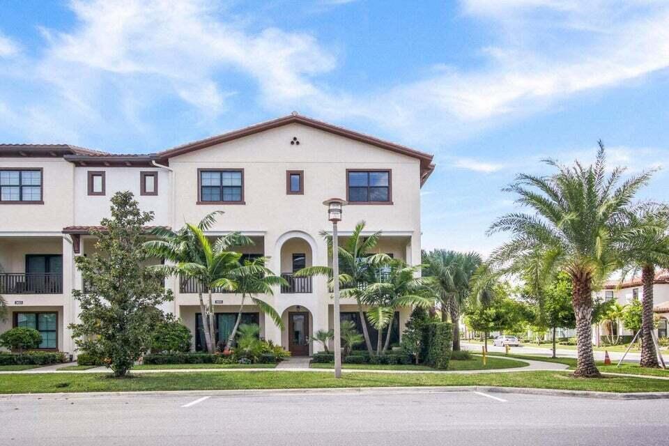 Amazing END UNIT townhome loaded with luxurious upgrades including 24x24 porcelain tile, gourmet kitchen with white cabinets and large center island with a mitered-edge 3' quartz countertop, upgraded appliances & a gas cooktop, Minka lighting and Hunter Douglas shades, California Closets & Built Ins. Filled with upgrades! This spacious floor plan includes 4 bedrooms, 3.5 baths & 2 car oversized garage with NEMA 14-50 EV outlet. Natural gas cooktop, oven, water heater and dryer & IMPACT WINDOWS & DOORS. Located in a prime quiet location in Alton within easy walking distance to Alton Town Center, this end unit offers 9 additional windows as well as a more enjoyable open balcony area.