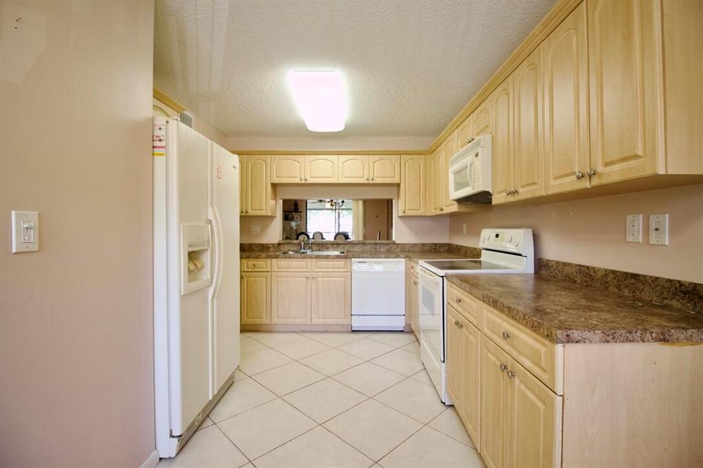 WATERSEDGE AT THE LAKES OF DELRAY CONDO A THRU H D - Residential