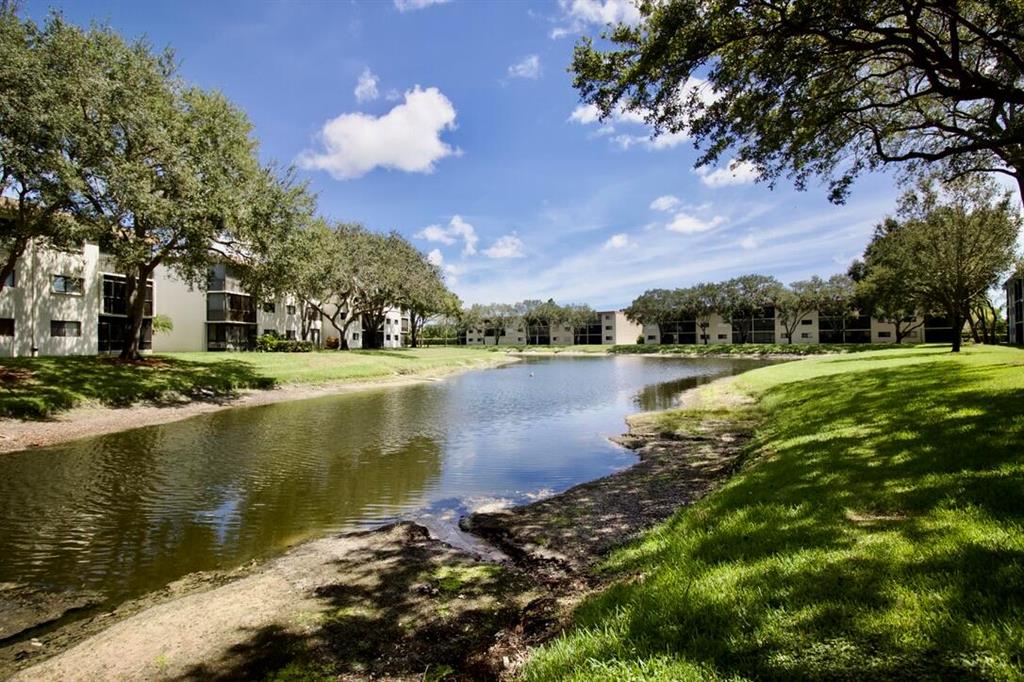 WATERSEDGE AT THE LAKES OF DELRAY CONDO A THRU H D - Residential
